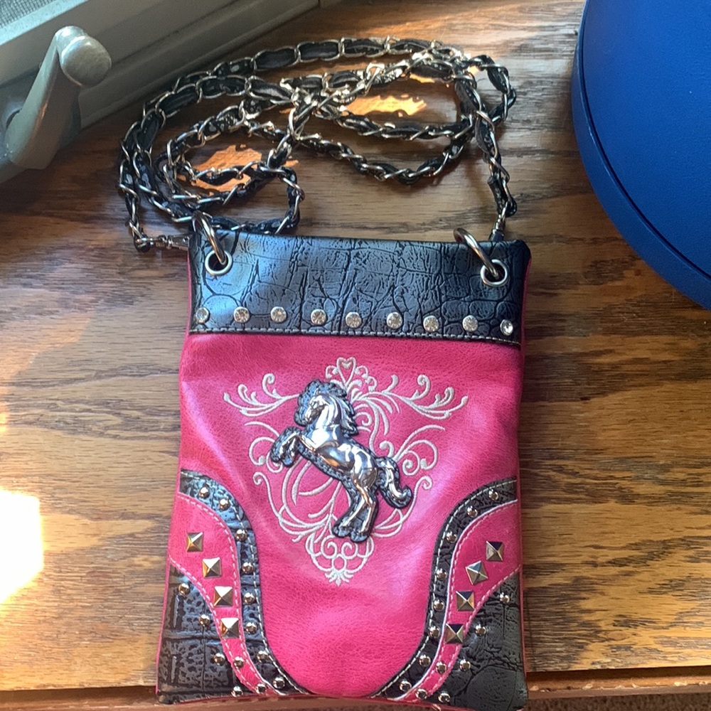 Unbranded western crossbody purse .
